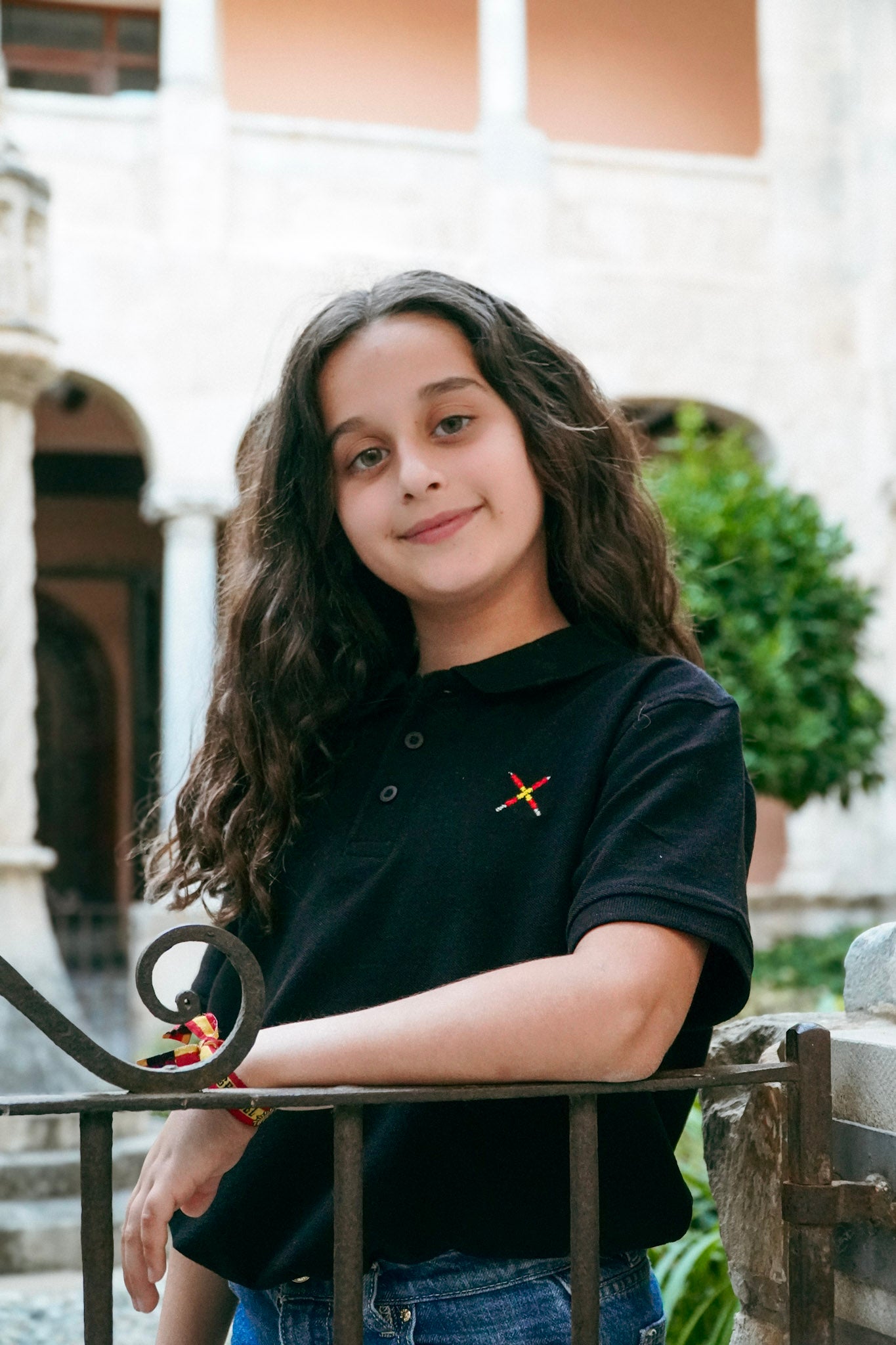 Polo "LUMINOSO" negro niño/a